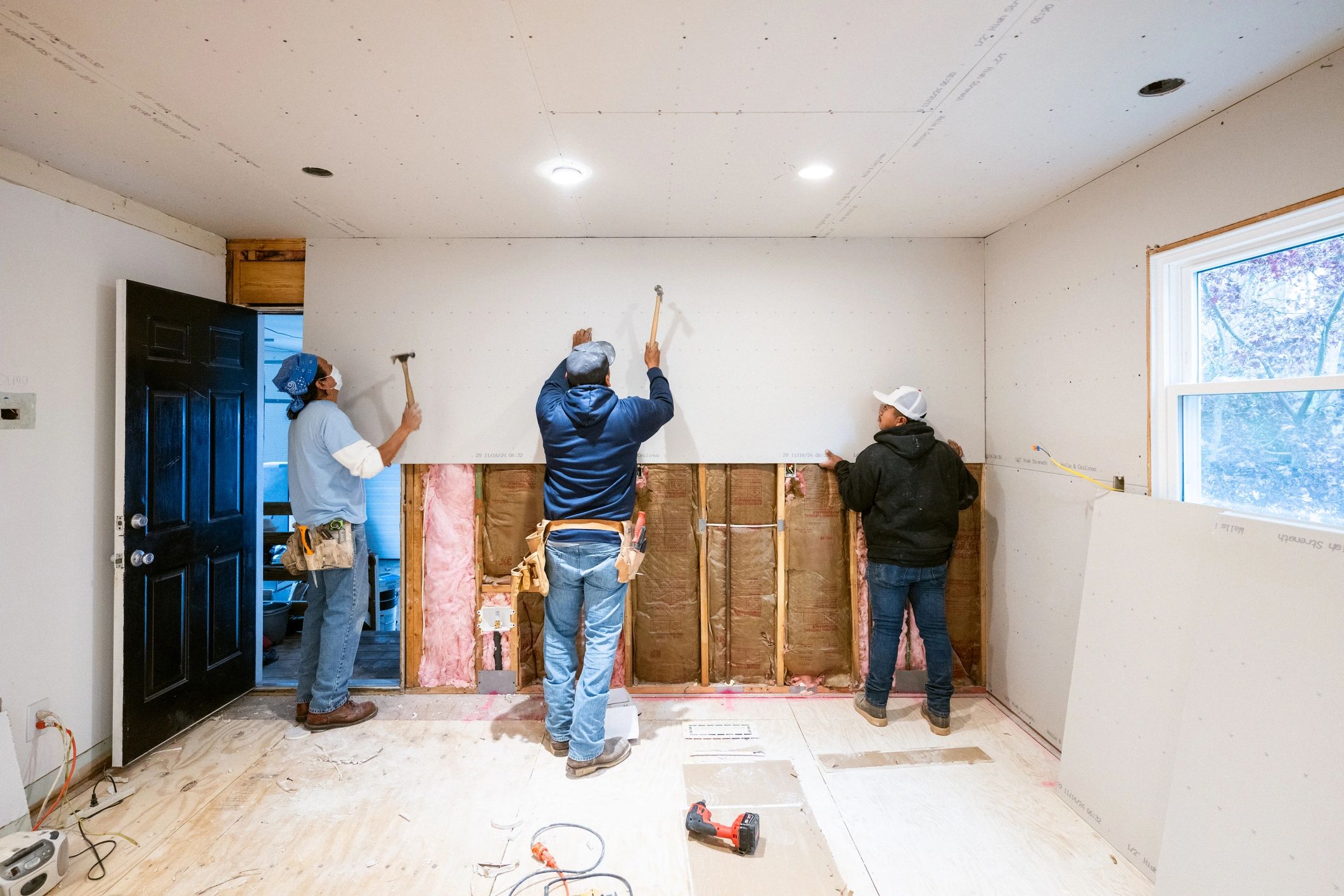 Construction professionals working on interior renovation